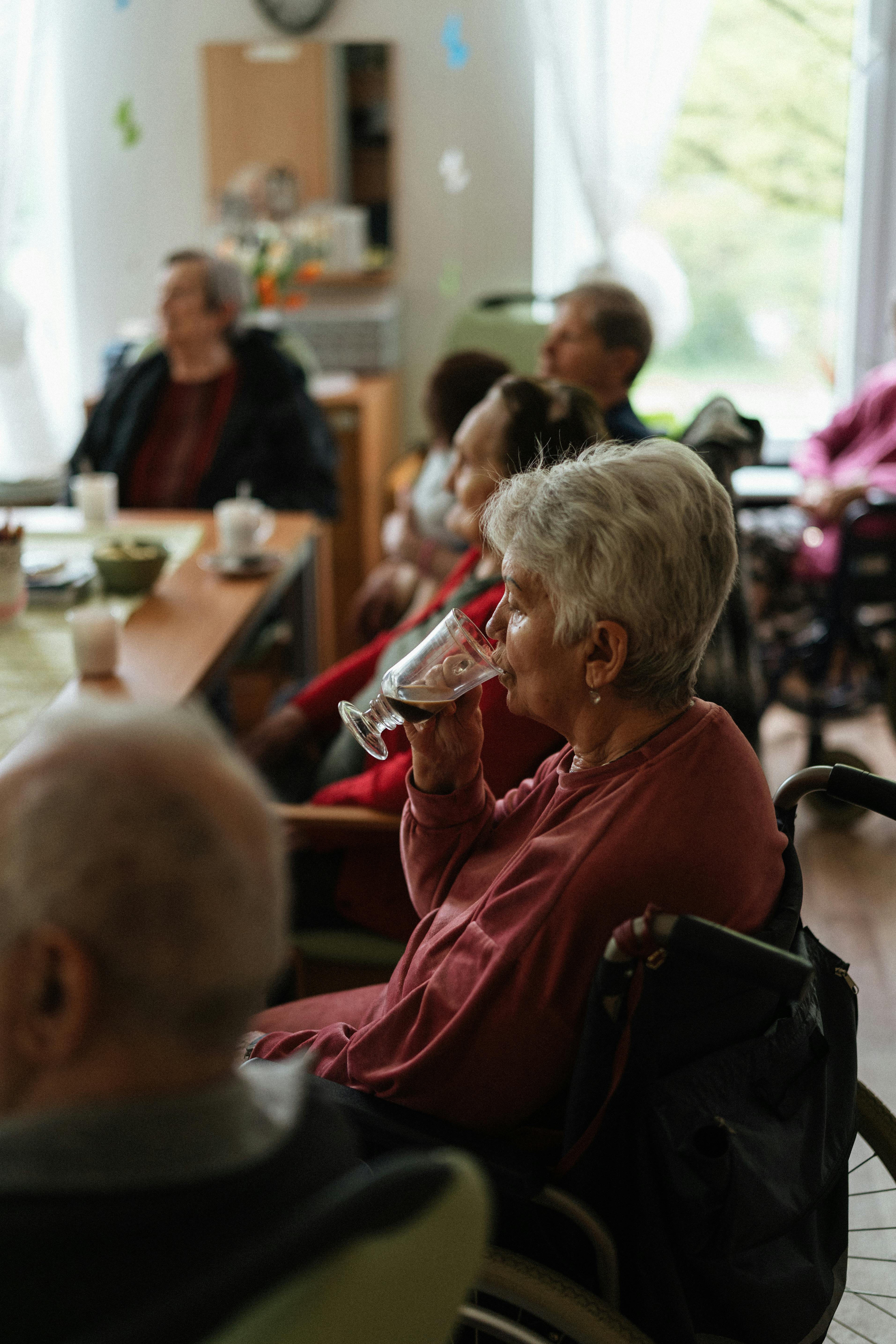 Caregiver sharing a warm moment with senior client at home