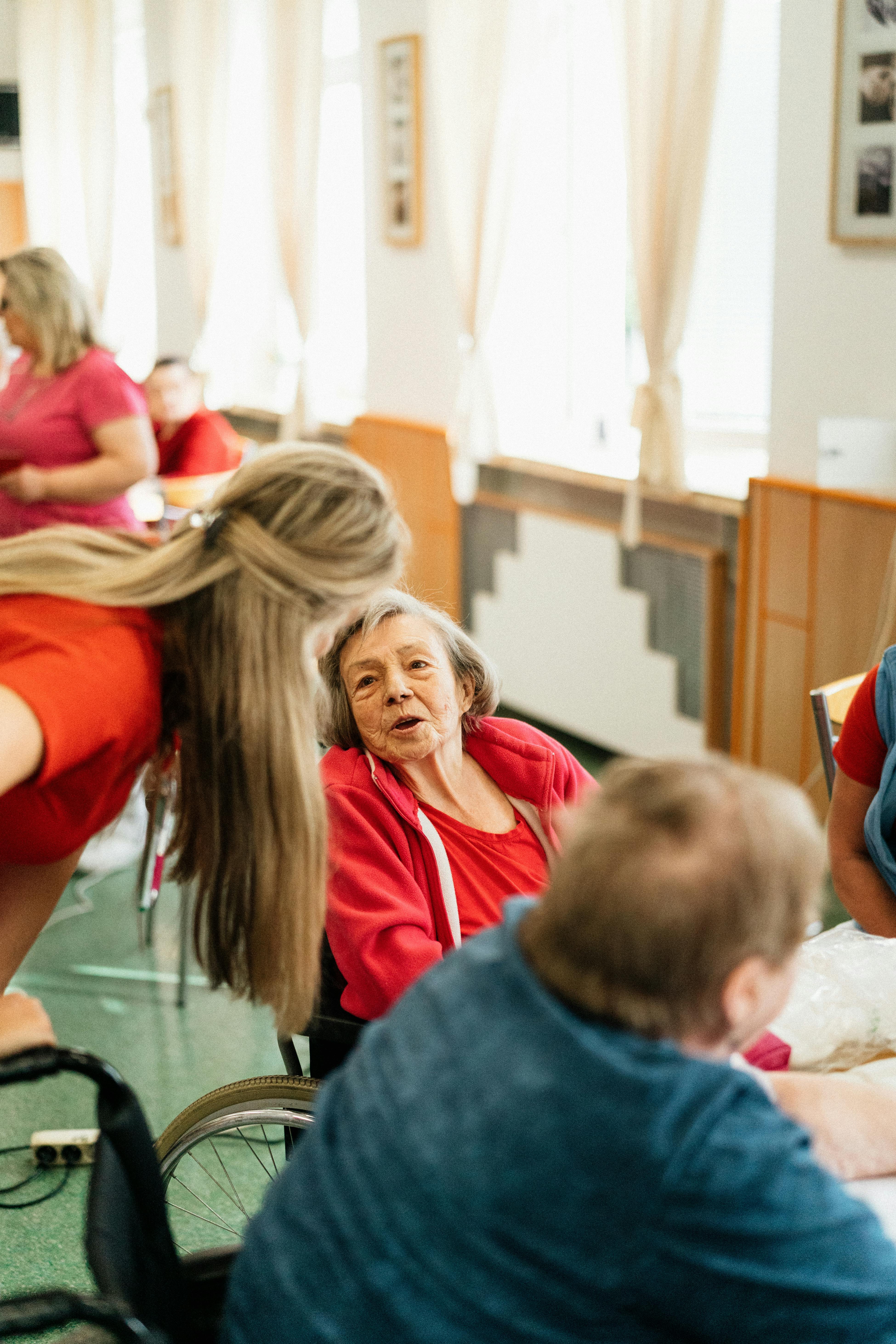 Home care aide assisting a senior at home