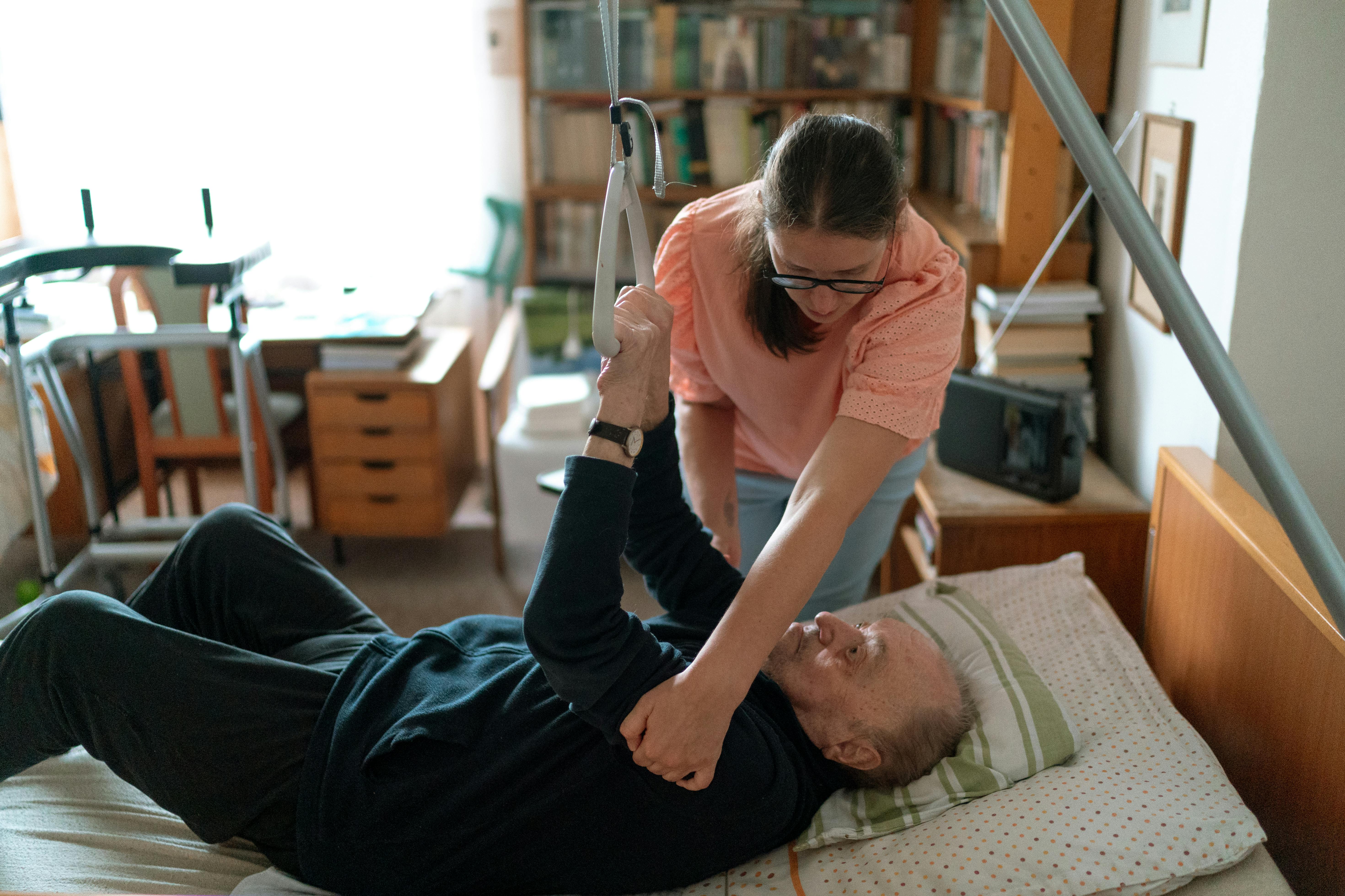 Caregiver helping senior with household tasks and errands